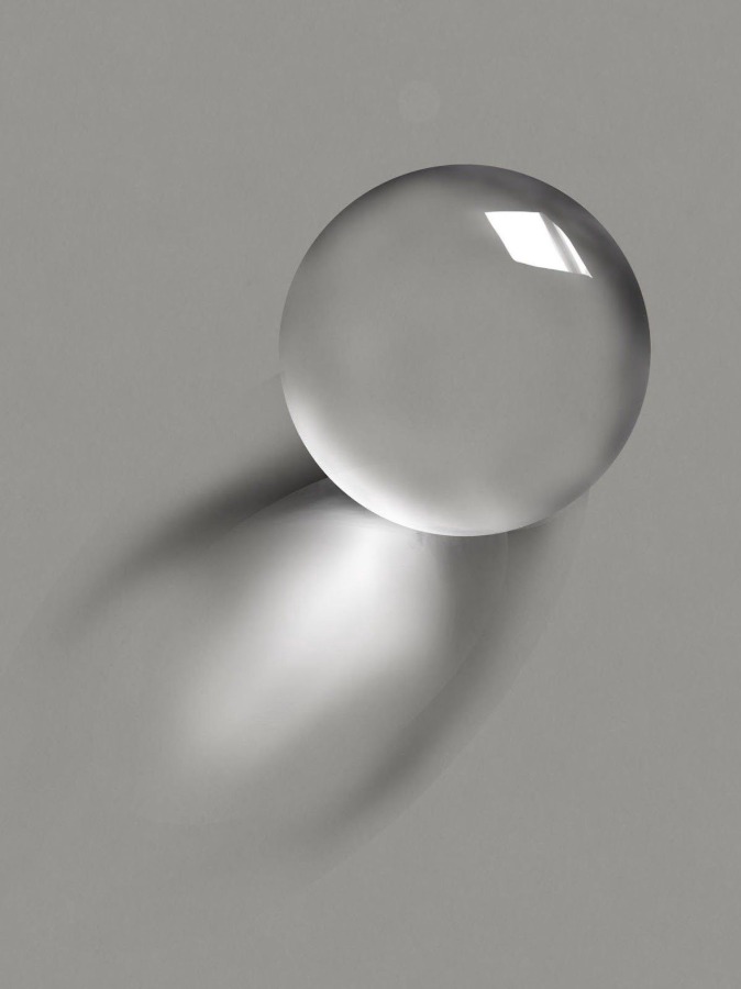 The transparency of a glass sphere